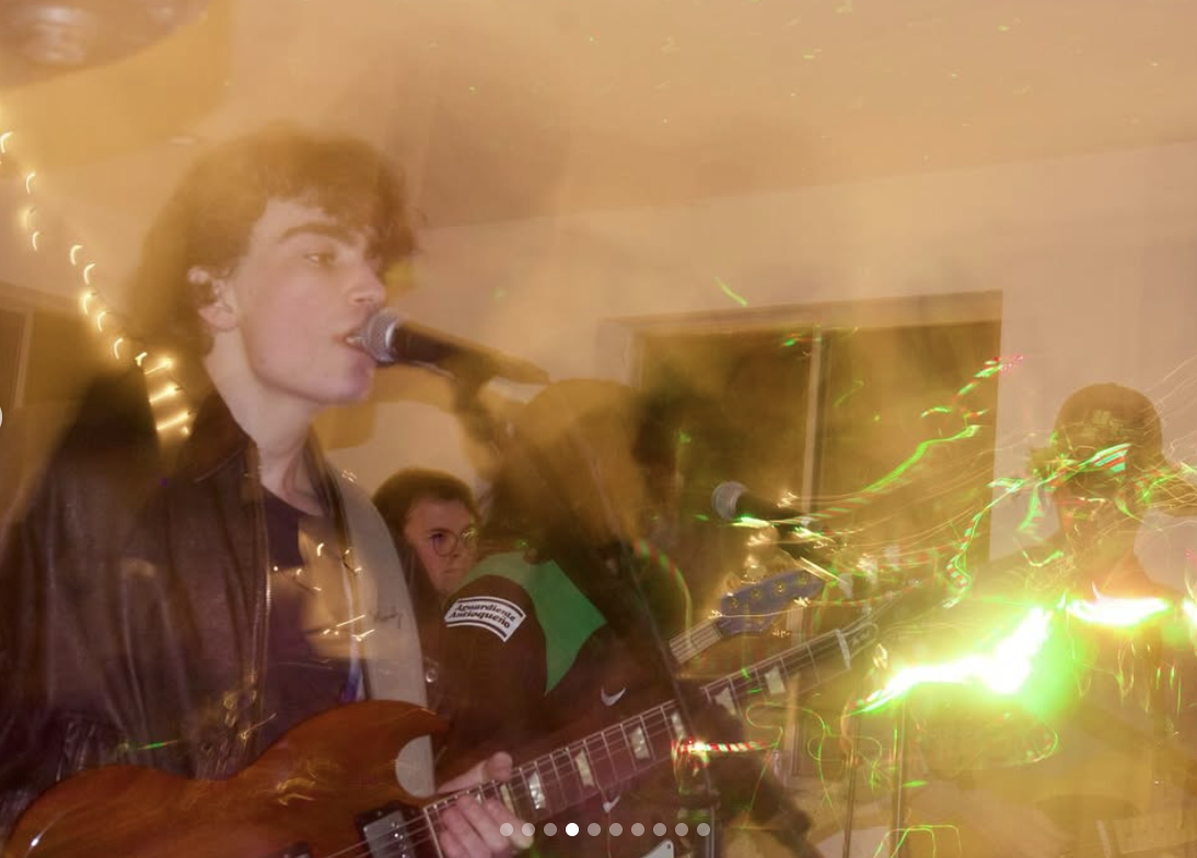 840 West - Double exposure guitarist performing