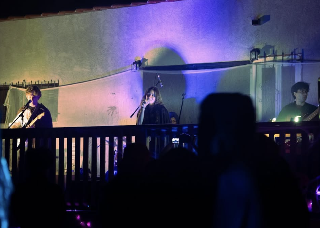 840 West - Outdoor rooftop concert with blue and purple lighting