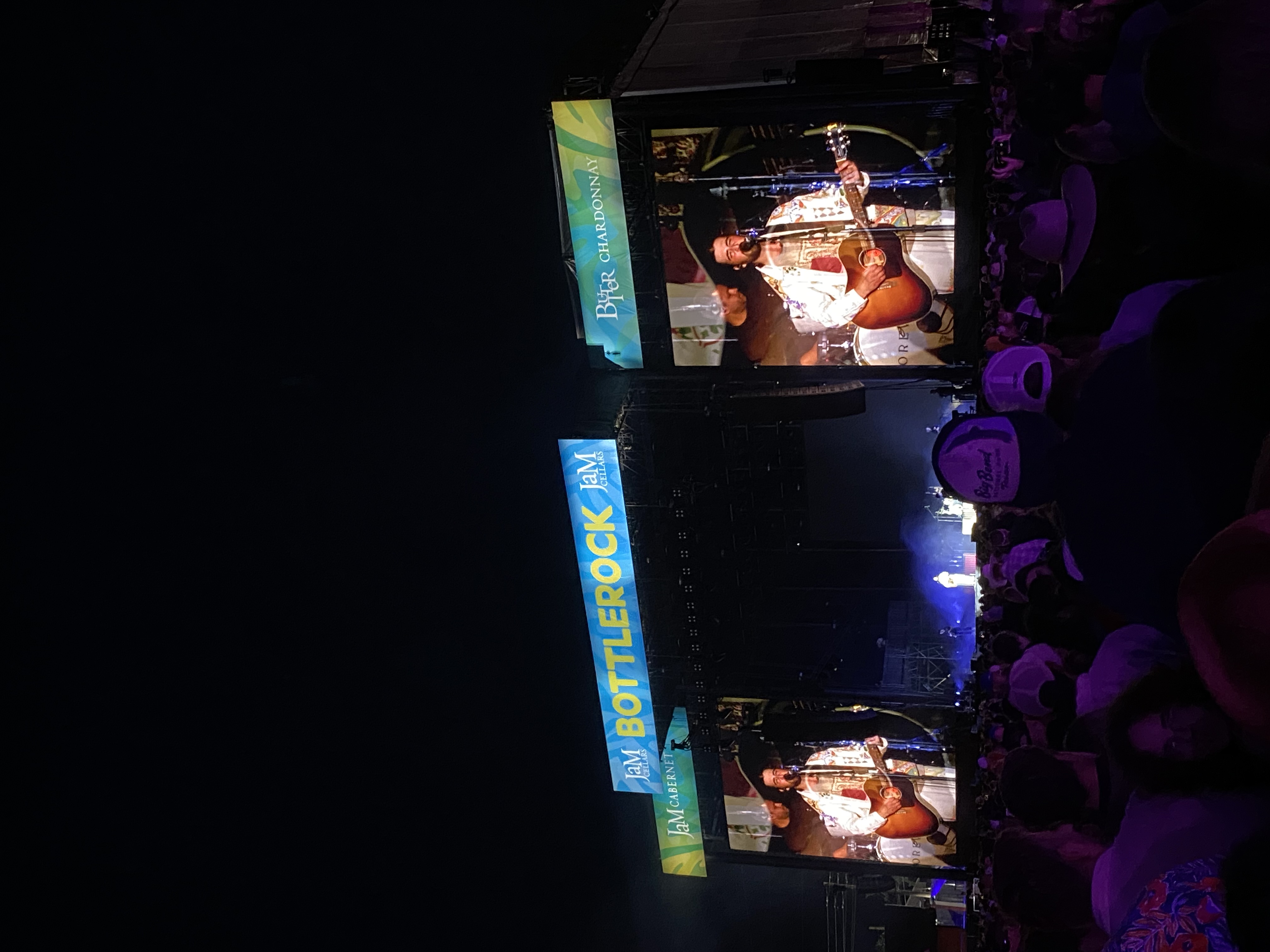 BottleRock nighttime with performer in embroidered white jacket