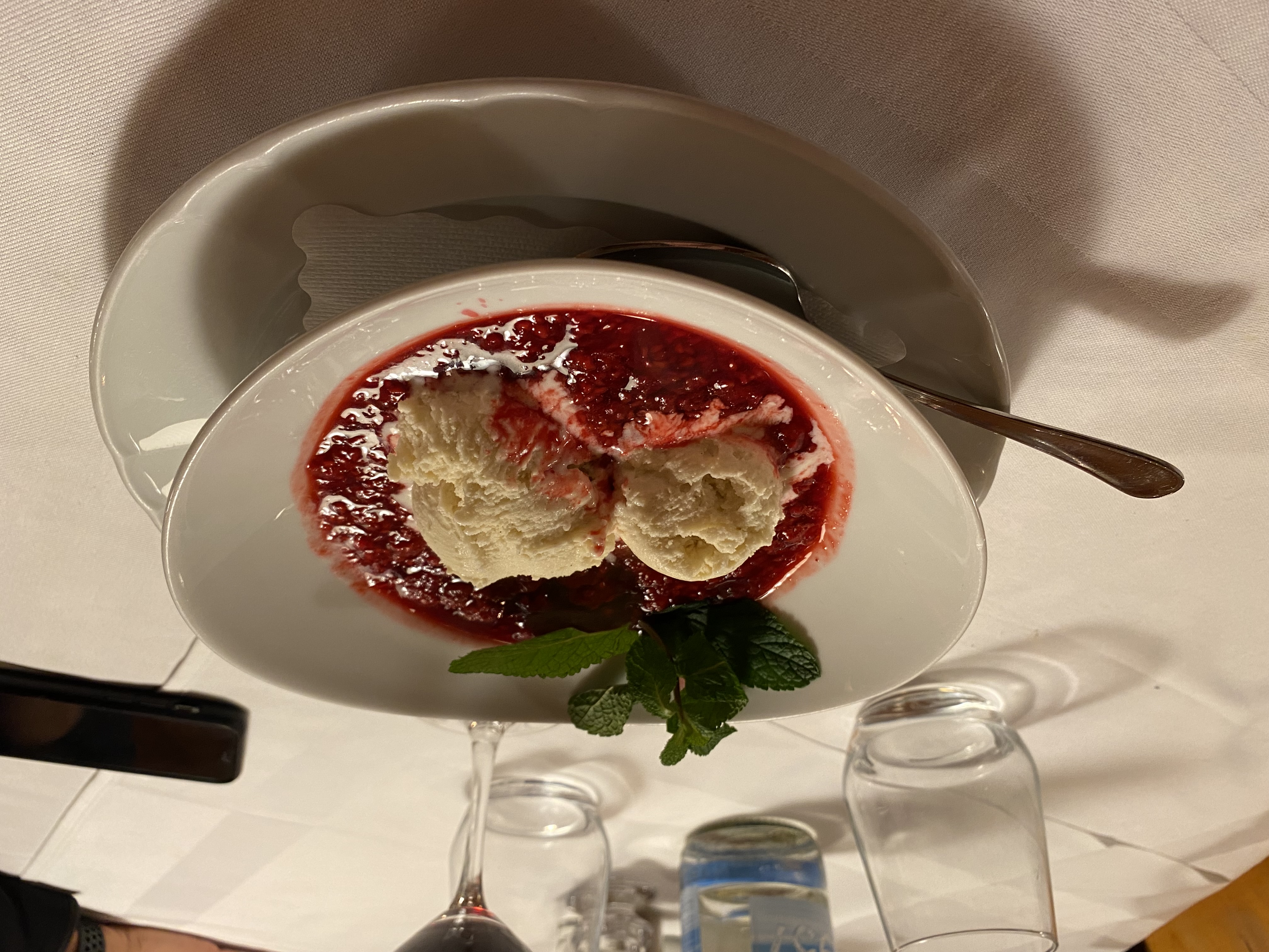 Vanilla ice cream with berry compote fine dining