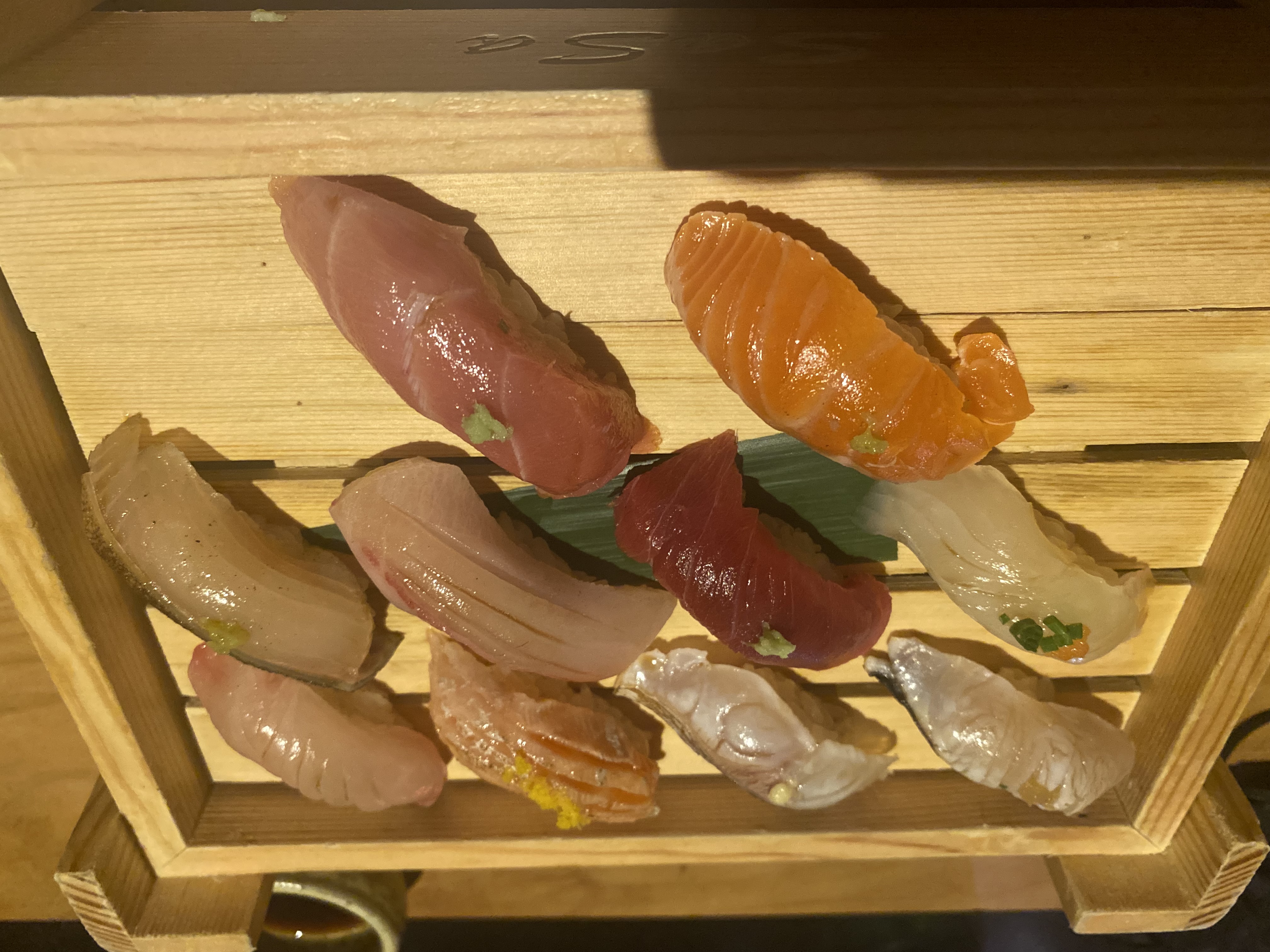 Omakase sushi platter on wooden board