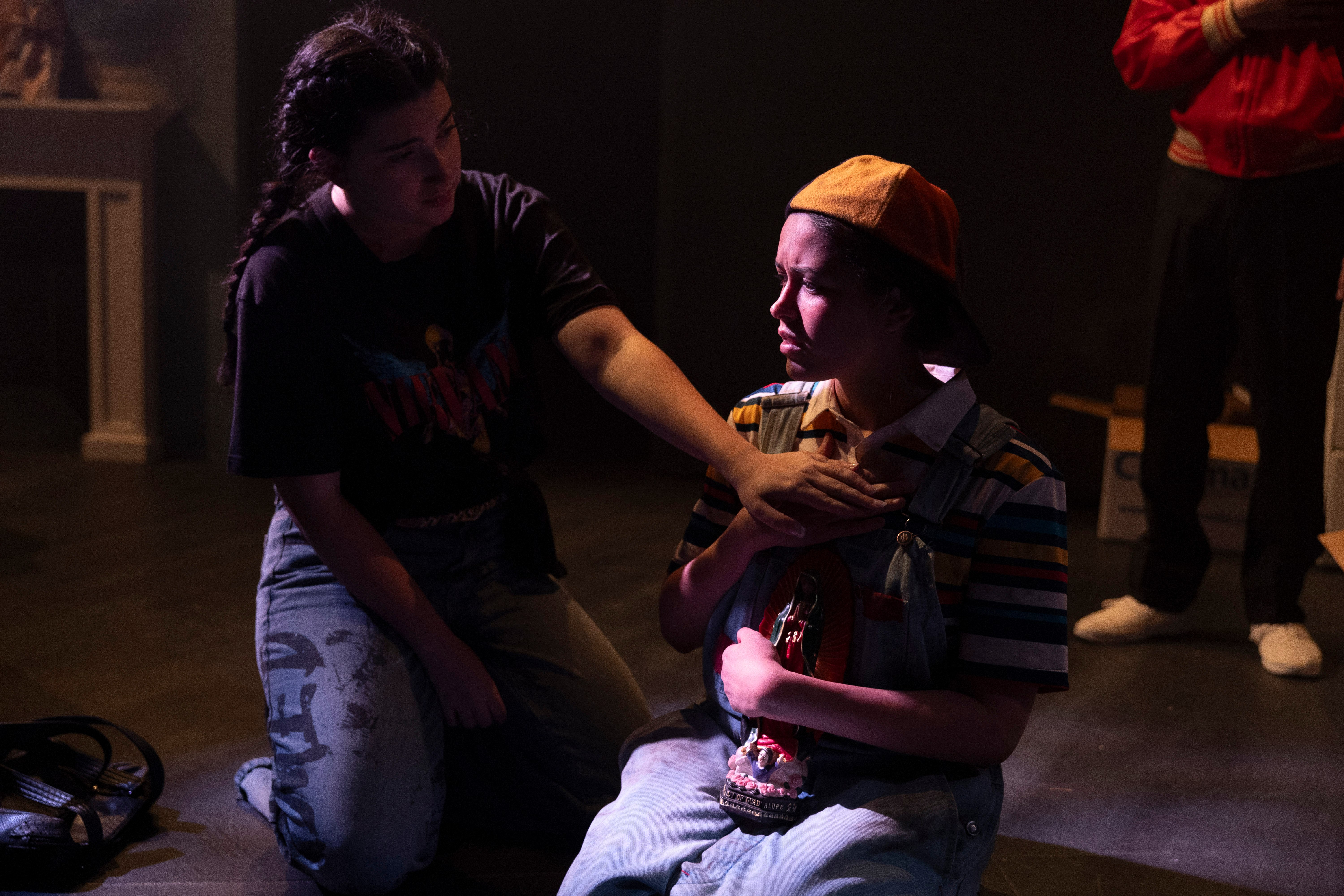 Between Fresno and Hell - Two women in emotional scene on floor