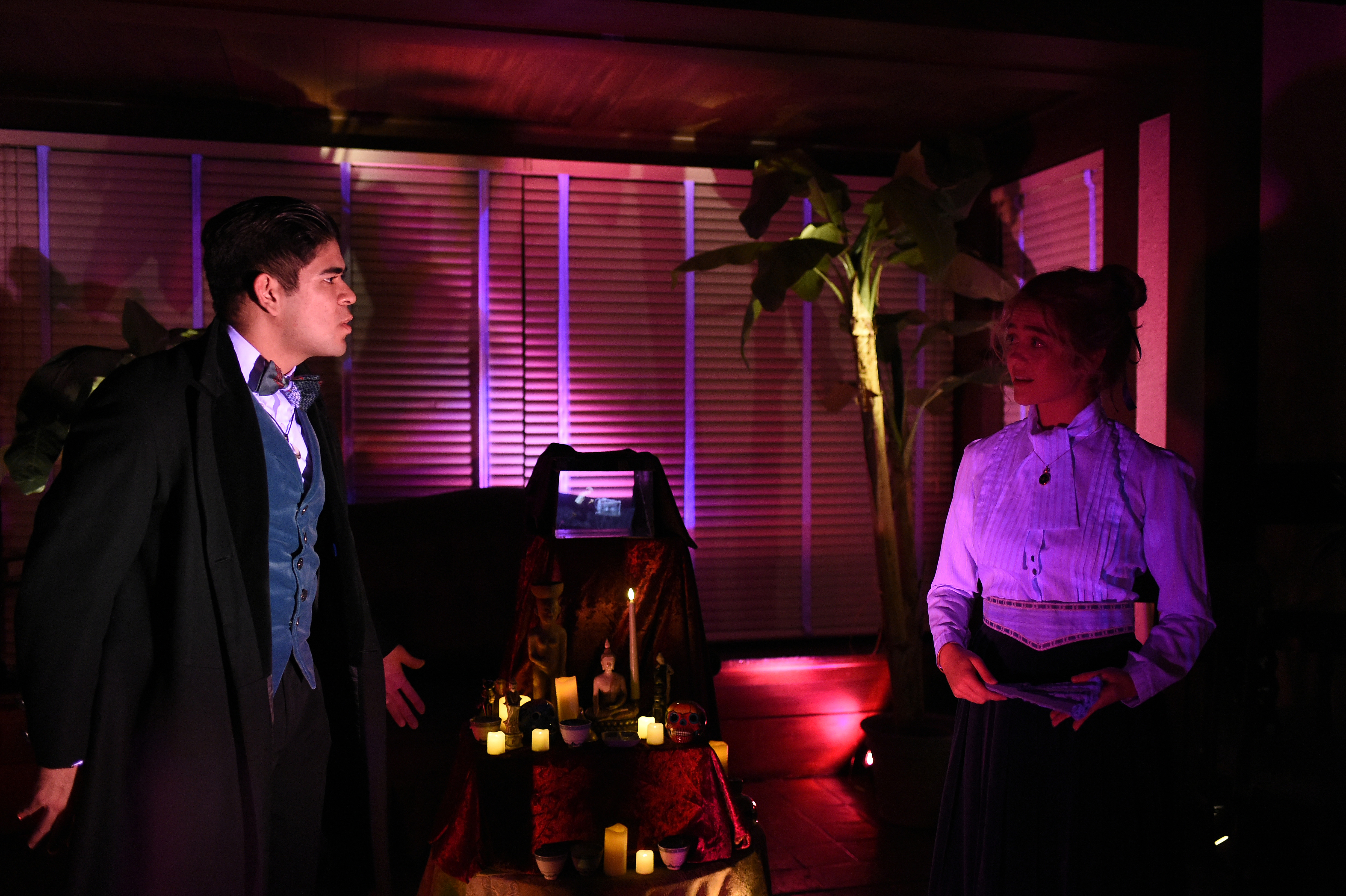 Ghosts of USC - Wide shot of couple at altar with magenta blinds