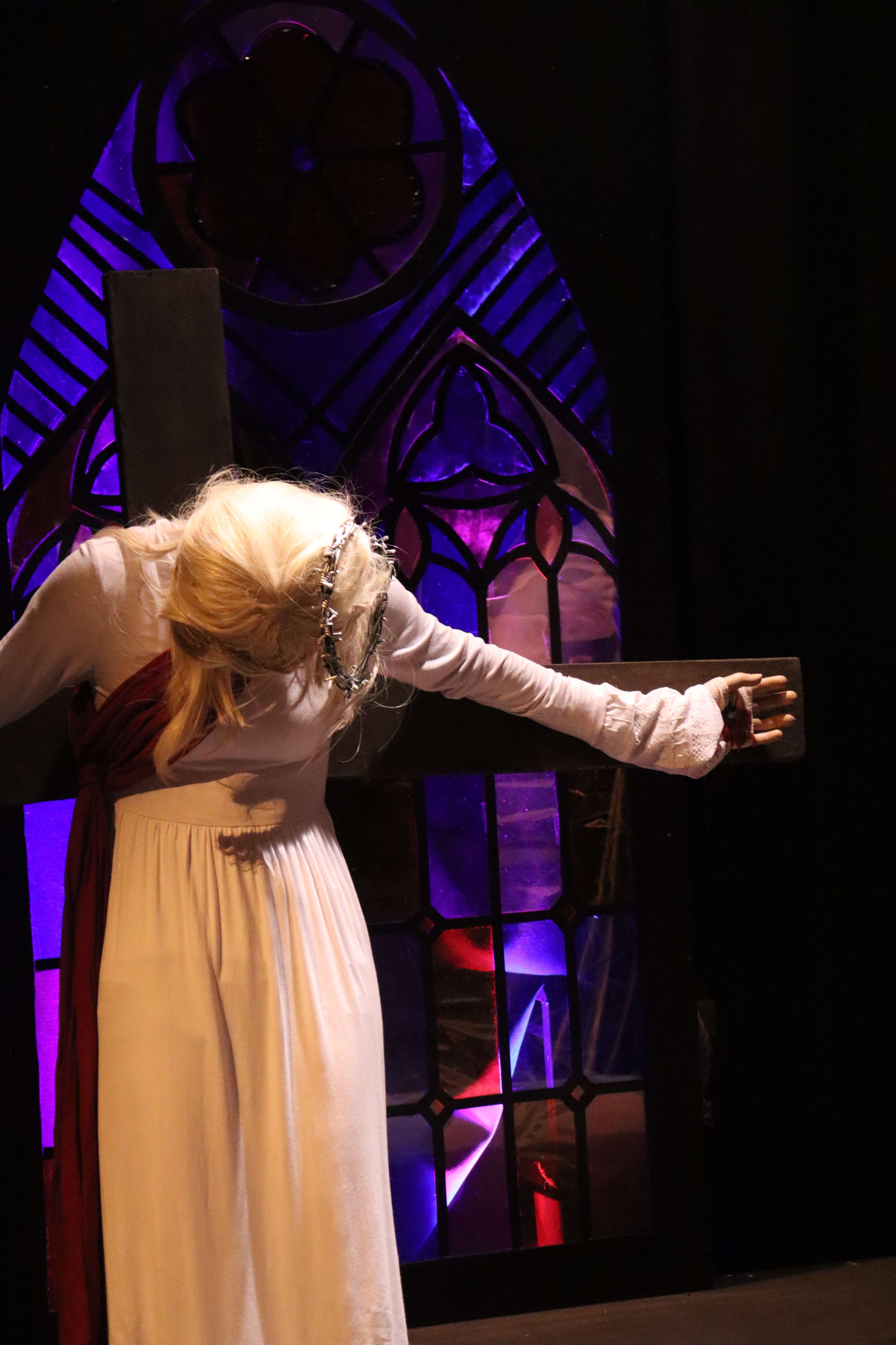 The Pillowman - Crucifixion scene with stained glass window
