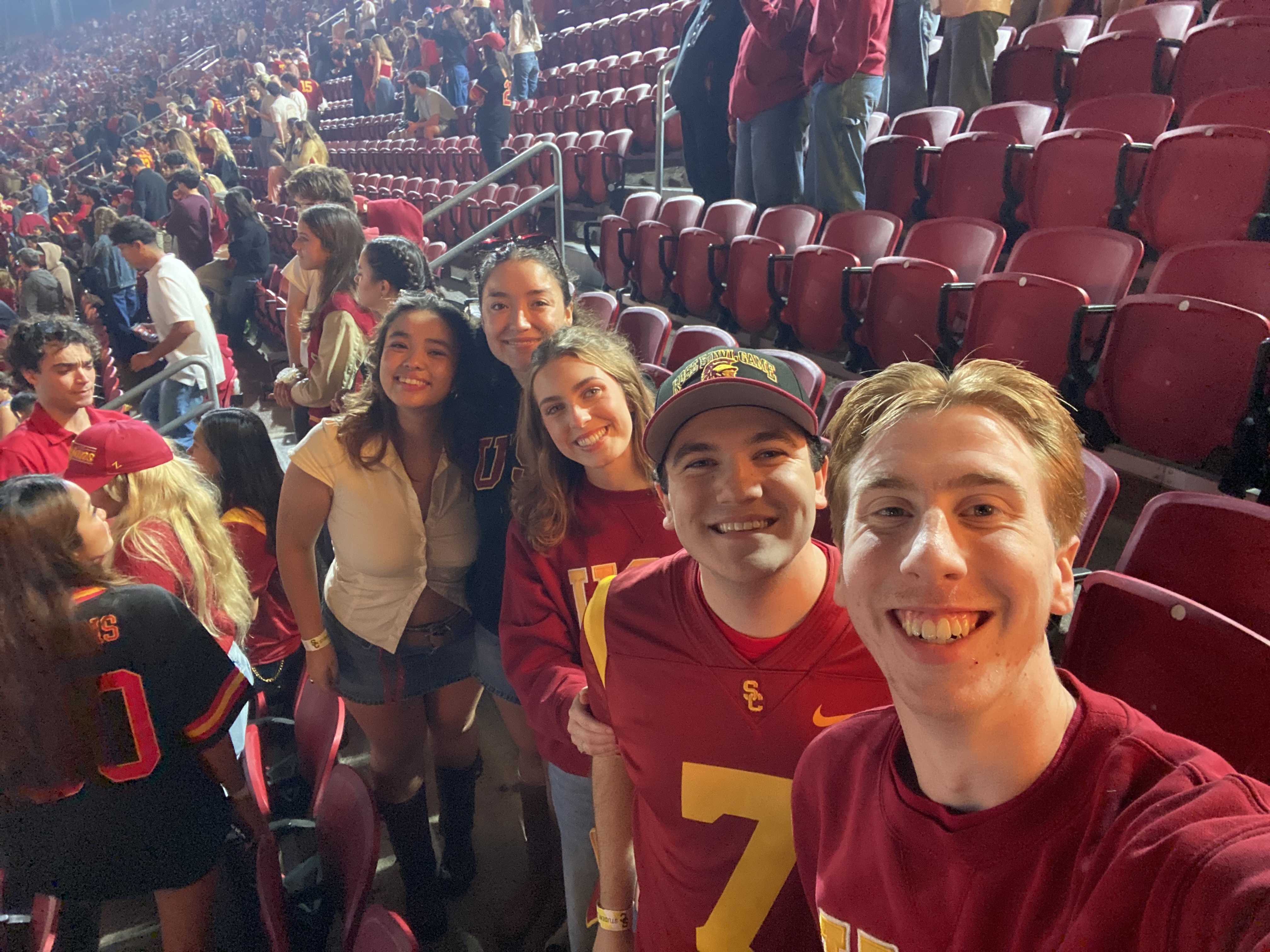USC football game group selfie at the Coliseum