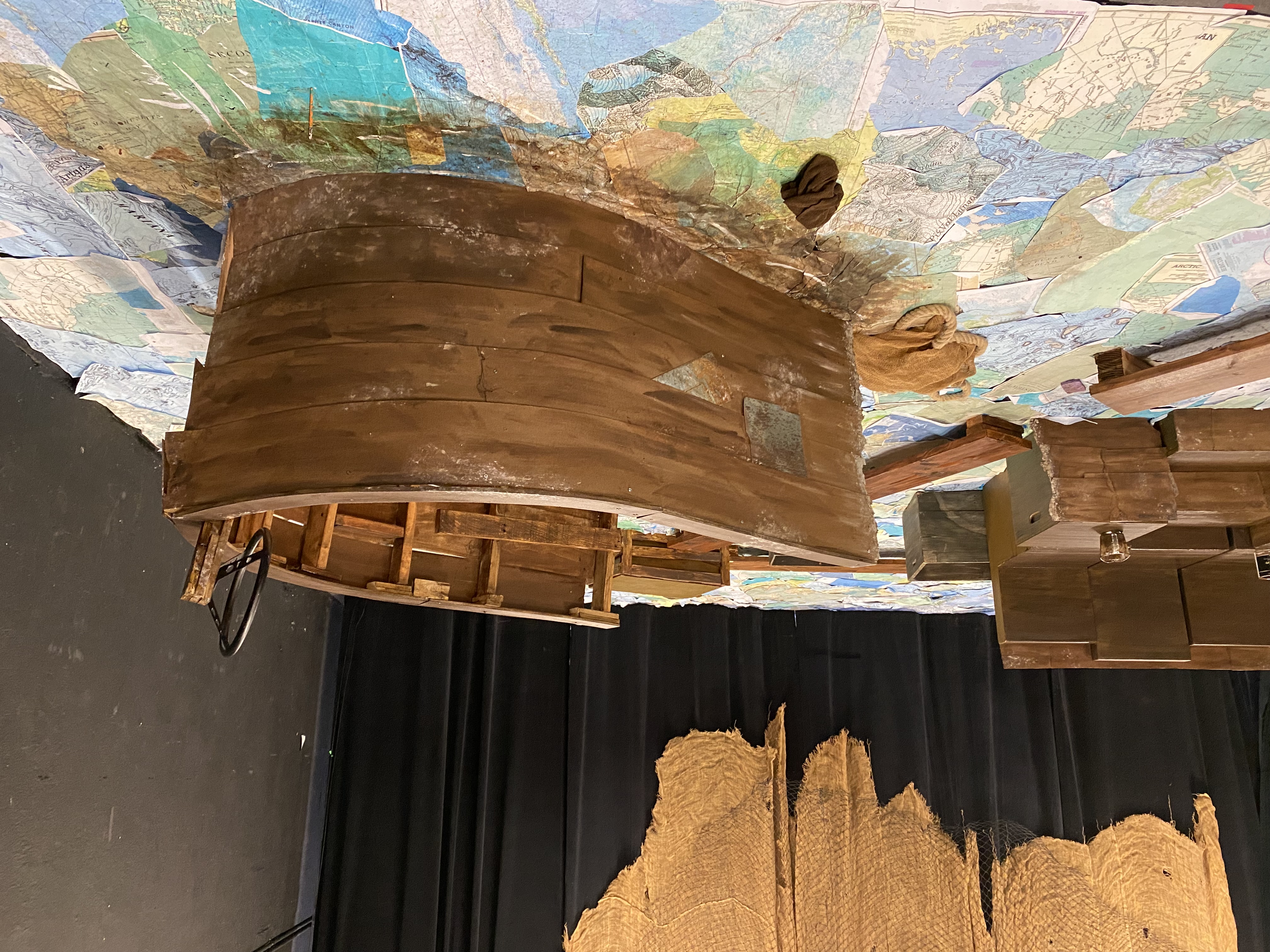 Sea Drift - Cardboard boat on paper map floor