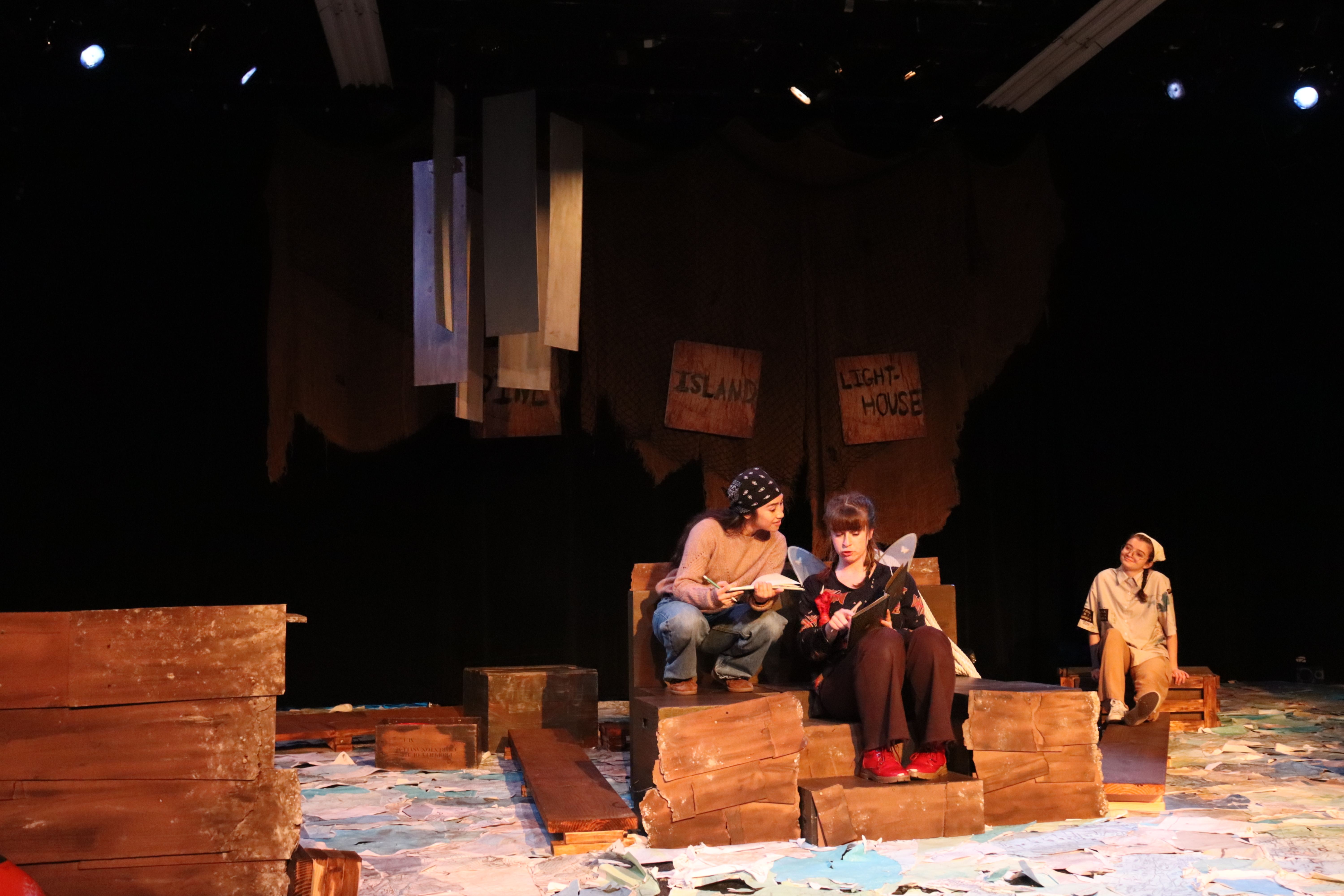 Sea Drift - Actors on cardboard set with Island and Lighthouse signs