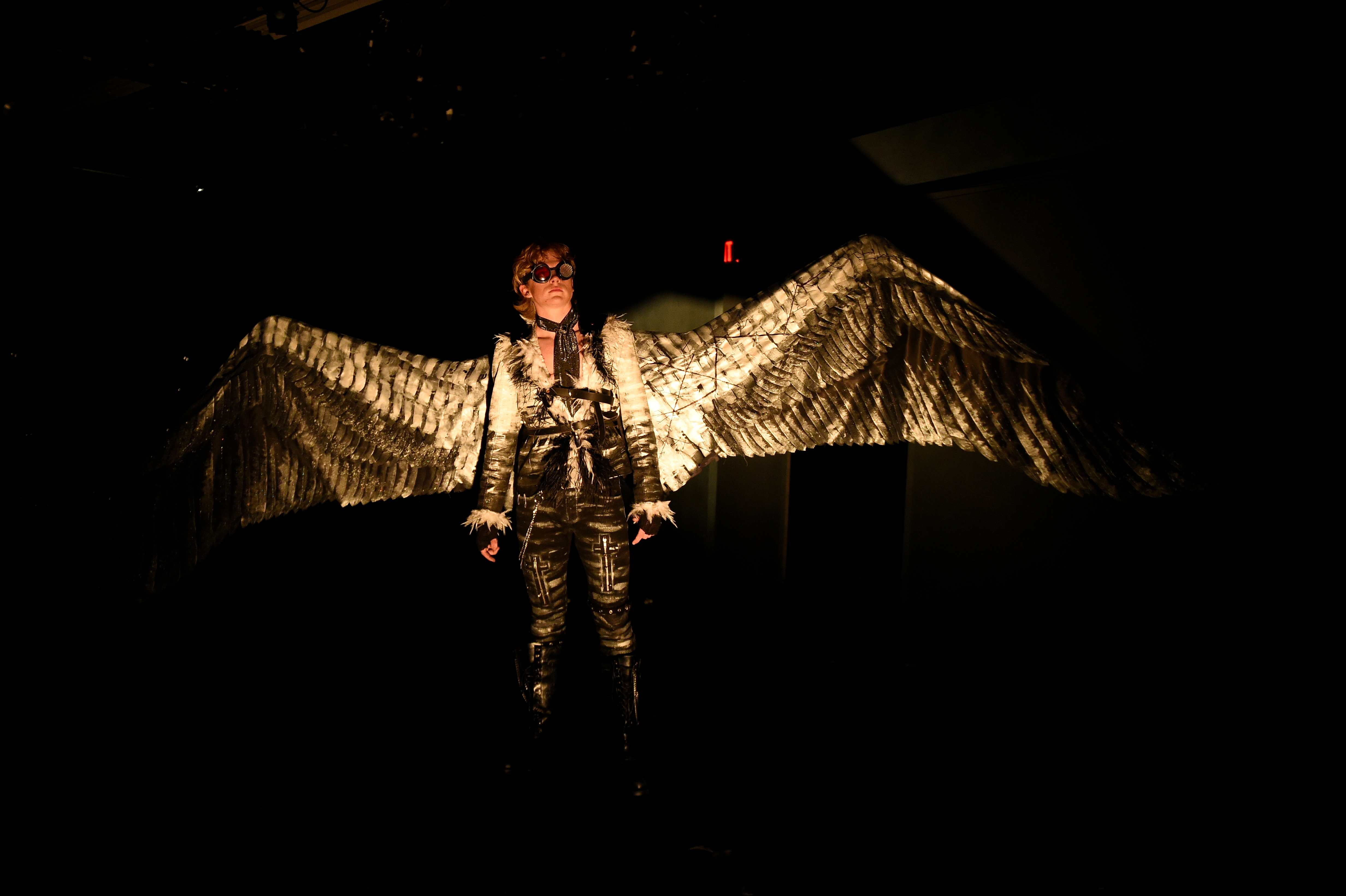 Somewhere Someone - Angel with massive wings fully spread, backlit