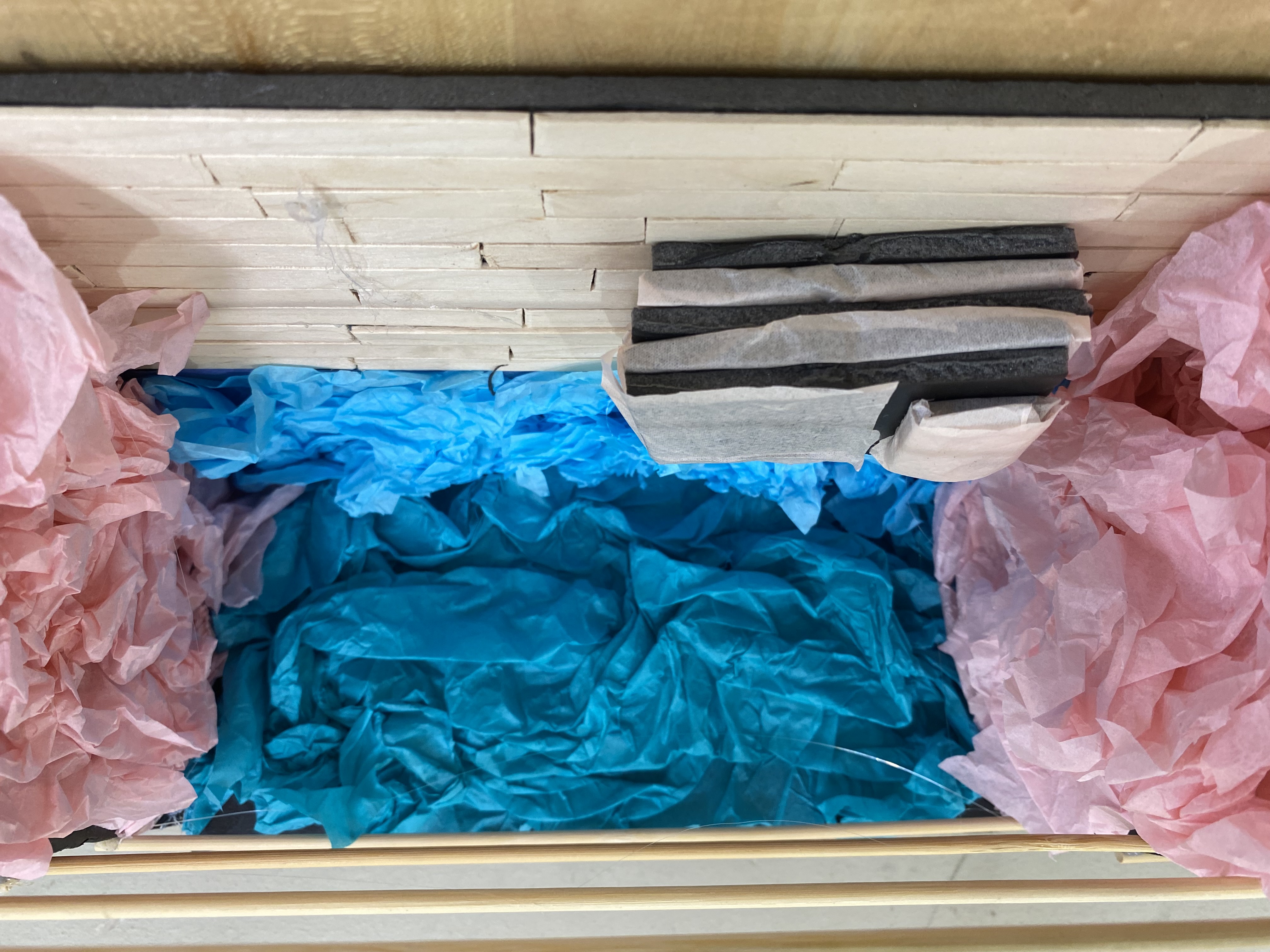 Teaching - Close-up stage model with pink tissue paper clouds and blue backdrop