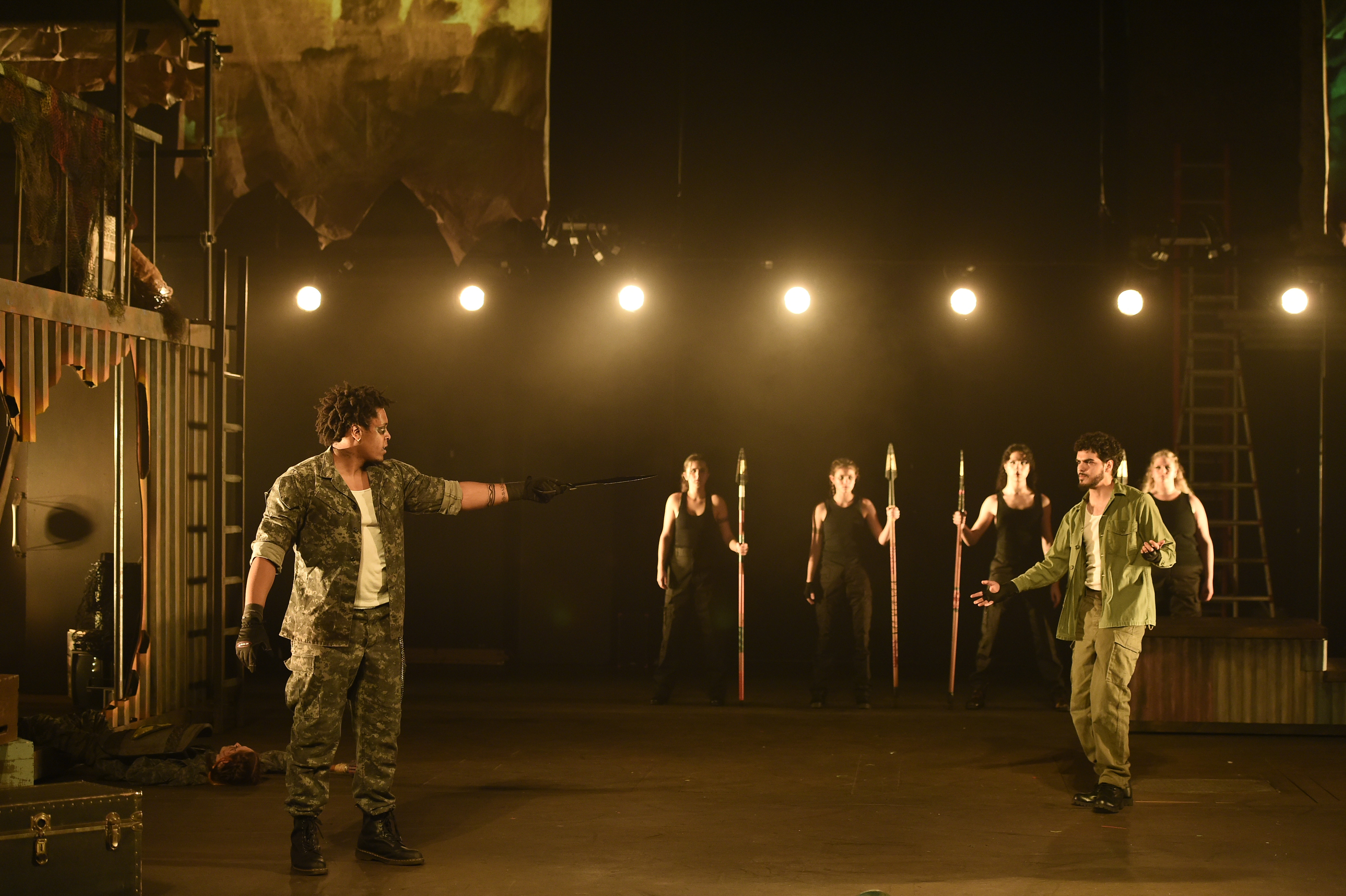Troilus and Cressida - Soldier pointing sword with chorus holding spears